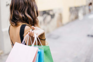 woman-holding-three-shopping-bags